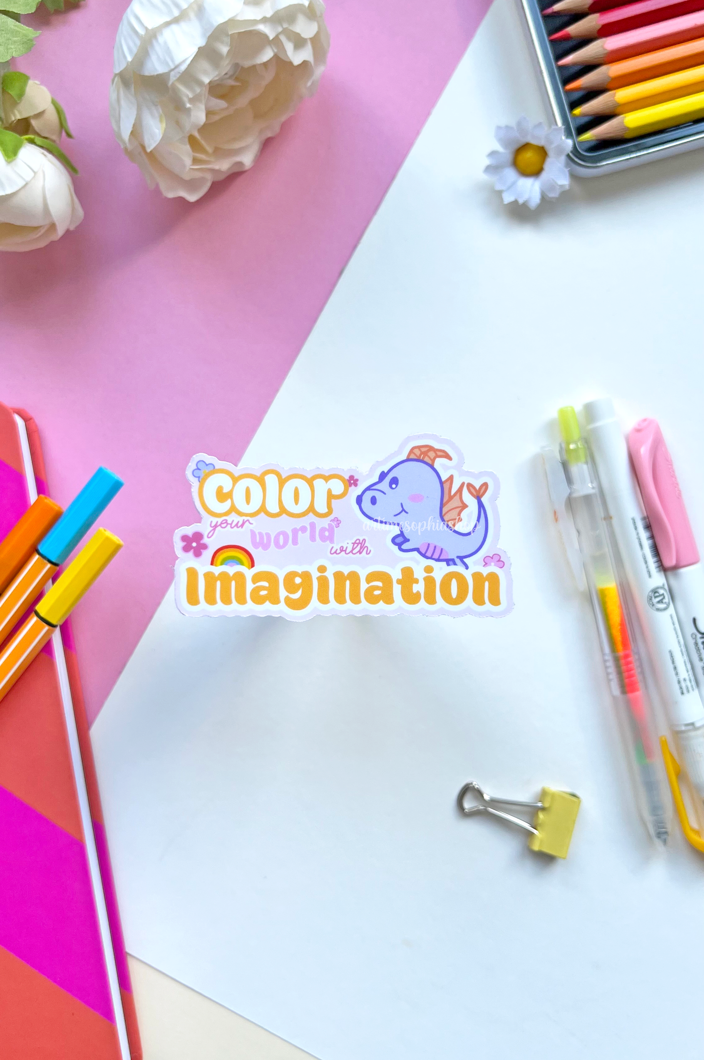 Vinyl sticker featuring Figment, art-themed doodles, and the quote “Color Your World With Imagination” — perfect for artists and dreamers.