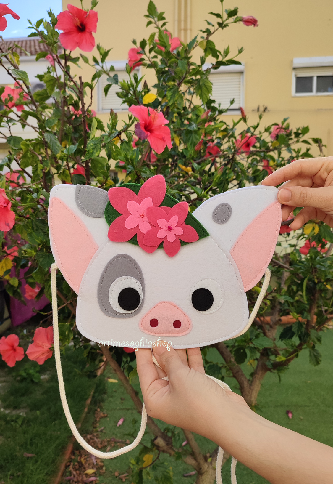 Handmade felt Plumeria Hawaiian Flower accessory inspired by Disney’s Moana. Customizable as keychain, pin, magnet, or hairclip. Symbolizes courage, adventure, and island spirit.