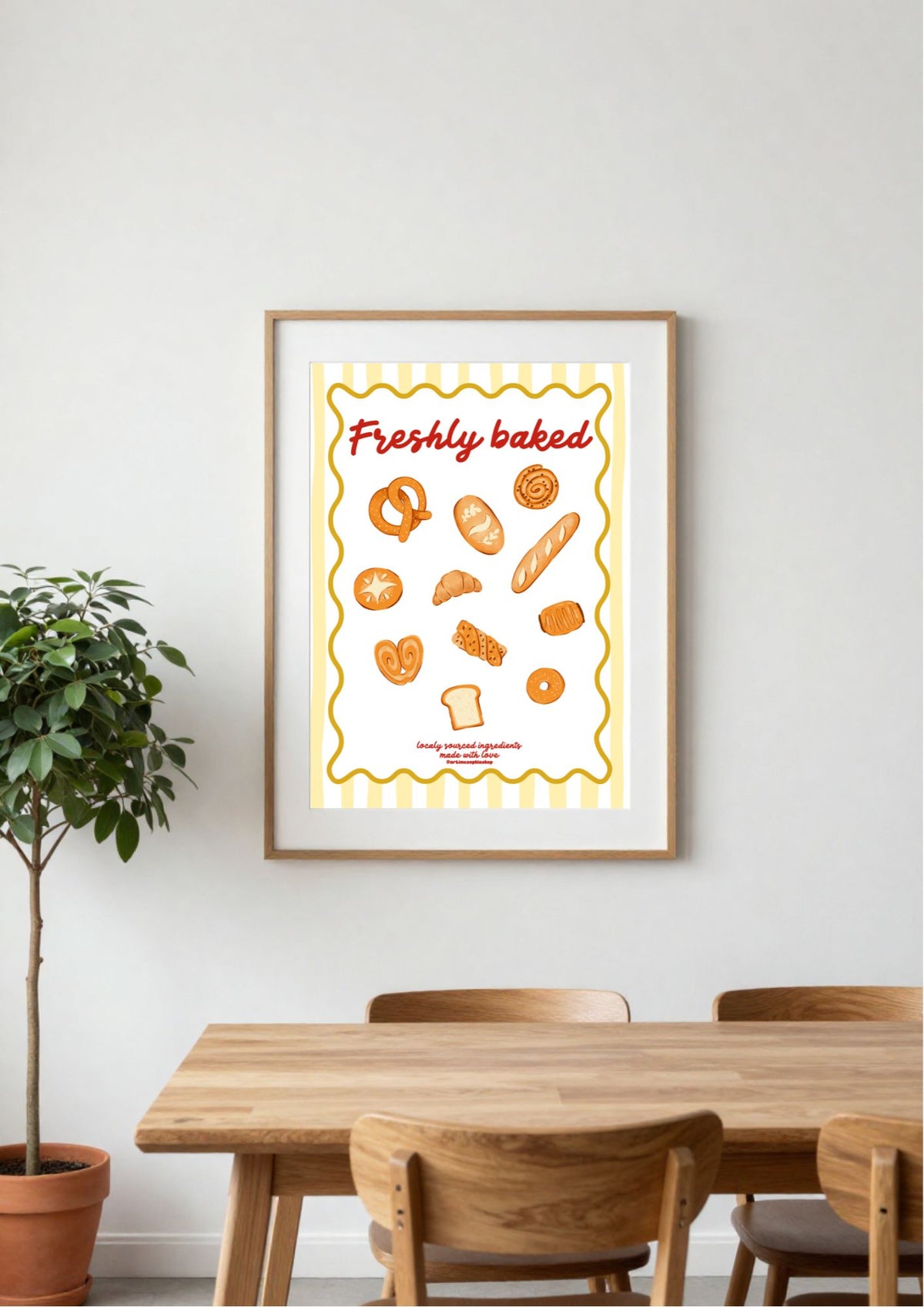 Illustrated bakery-themed art print featuring hand-drawn breads and pastries with the phrase "Freshly Baked" on a yellow striped background.