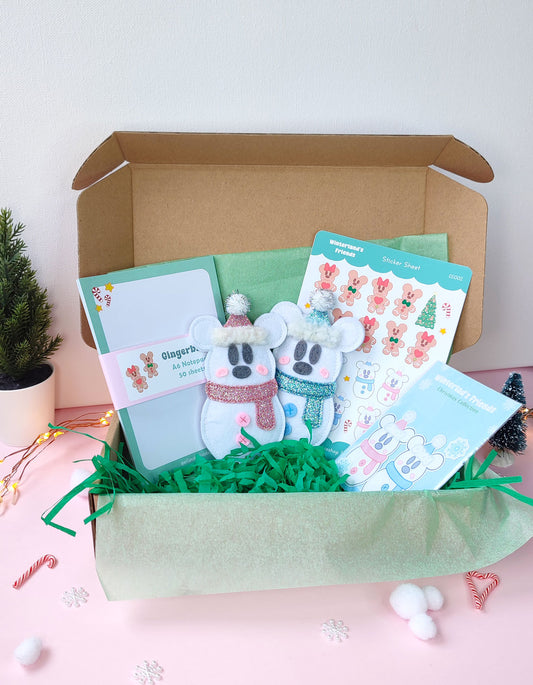 Christmas gift bundle featuring Snowmice Mickey & Minnie felt ornaments, holiday-themed notepad, and two festive sticker sets with cozy winter designs