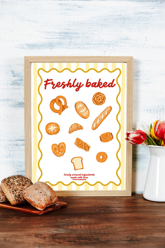 Illustrated bakery-themed art print featuring hand-drawn breads and pastries with the phrase "Freshly Baked" on a yellow striped background.