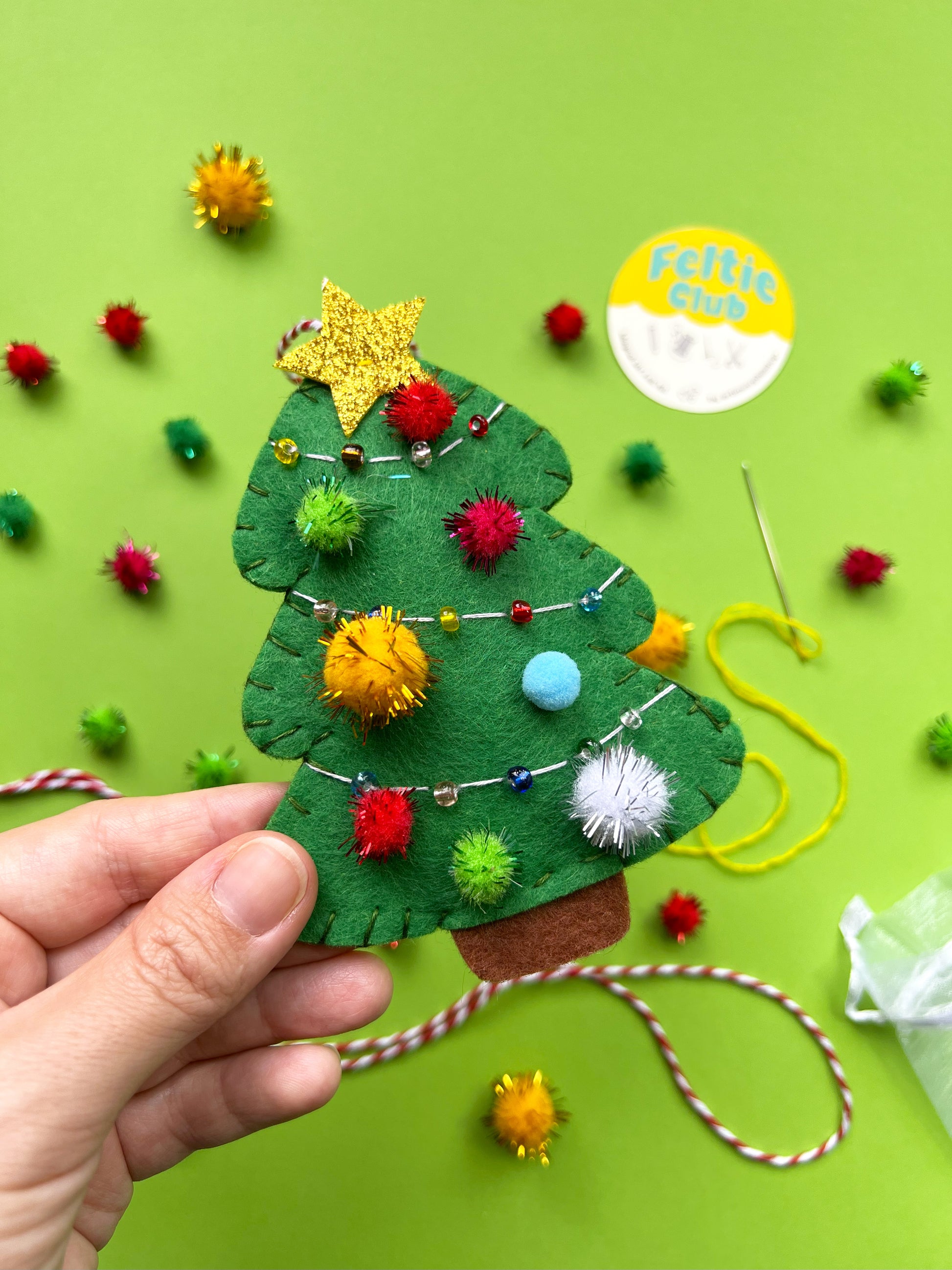A magical DIY felt kit to craft your own Christmas Tree ornament. Perfect for creative souls and handmade gift lovers!