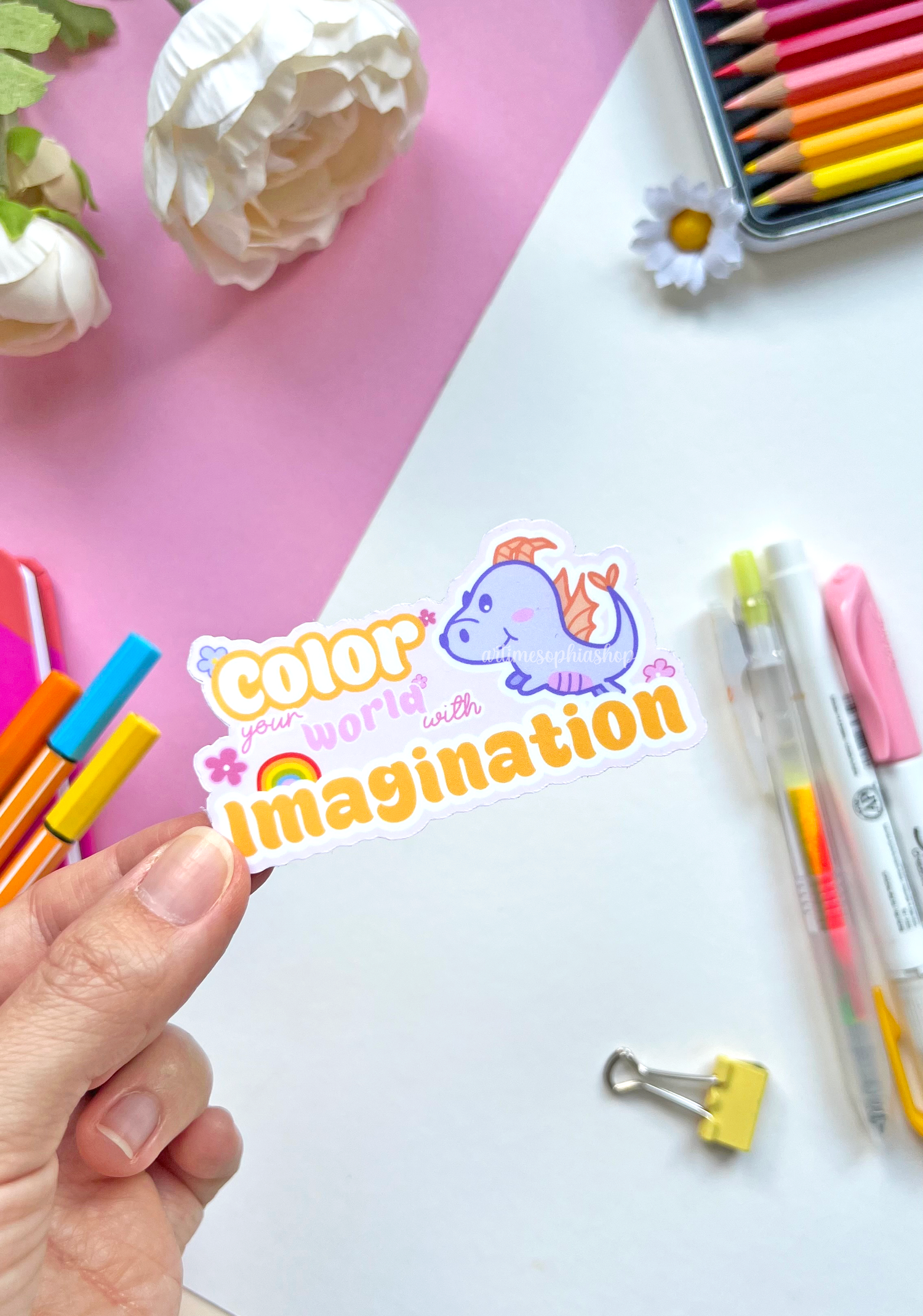 Vinyl sticker featuring Figment, art-themed doodles, and the quote “Color Your World With Imagination” — perfect for artists and dreamers.