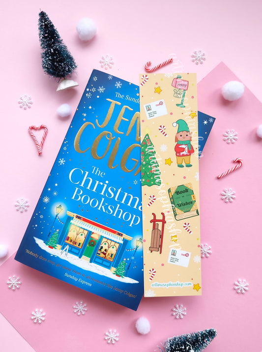 Illustrated Christmas bookmark with Elf Ellie, a vintage post office, and magical details, available in soft pink or cheerful yellow.