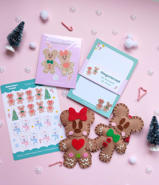 Christmas gift bundle featuring handmade gingerbread Mickey & Minnie ornaments, festive notepad, and holiday sticker packs with Disney-inspired designs