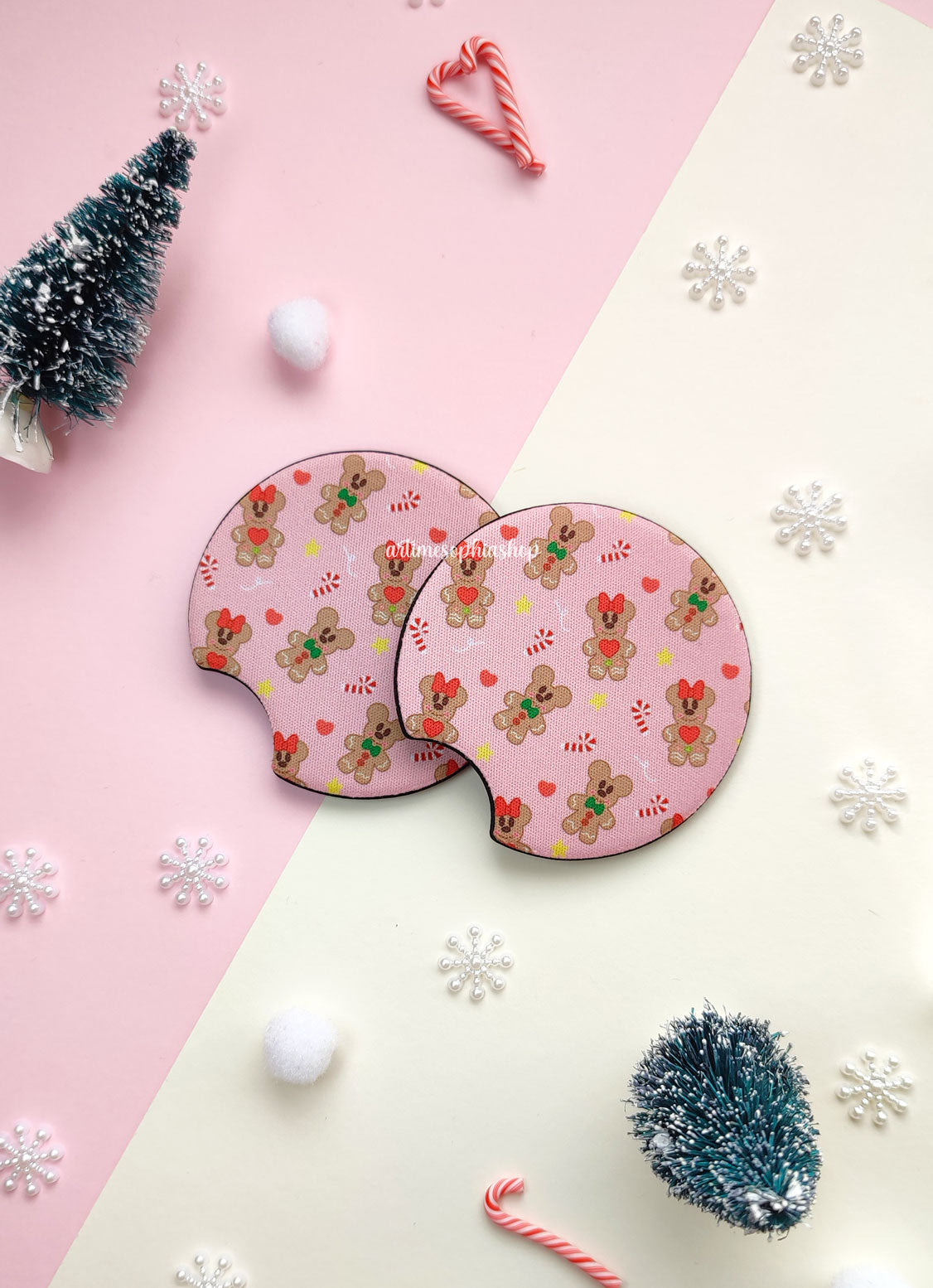 Set of two round car coasters featuring gingerbread Mickey and Minnie designs with festive holiday colors and cute cookie details.