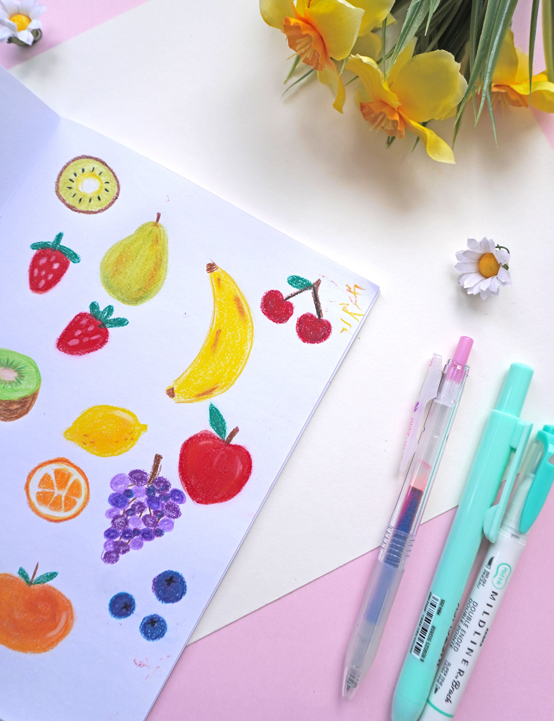 Drawing inside the "The Garden I'm Growing" notebook with illustrated duck and floral cover