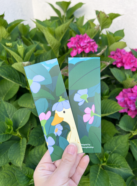 Cute reading bookmark with hand-drawn duck and flowers