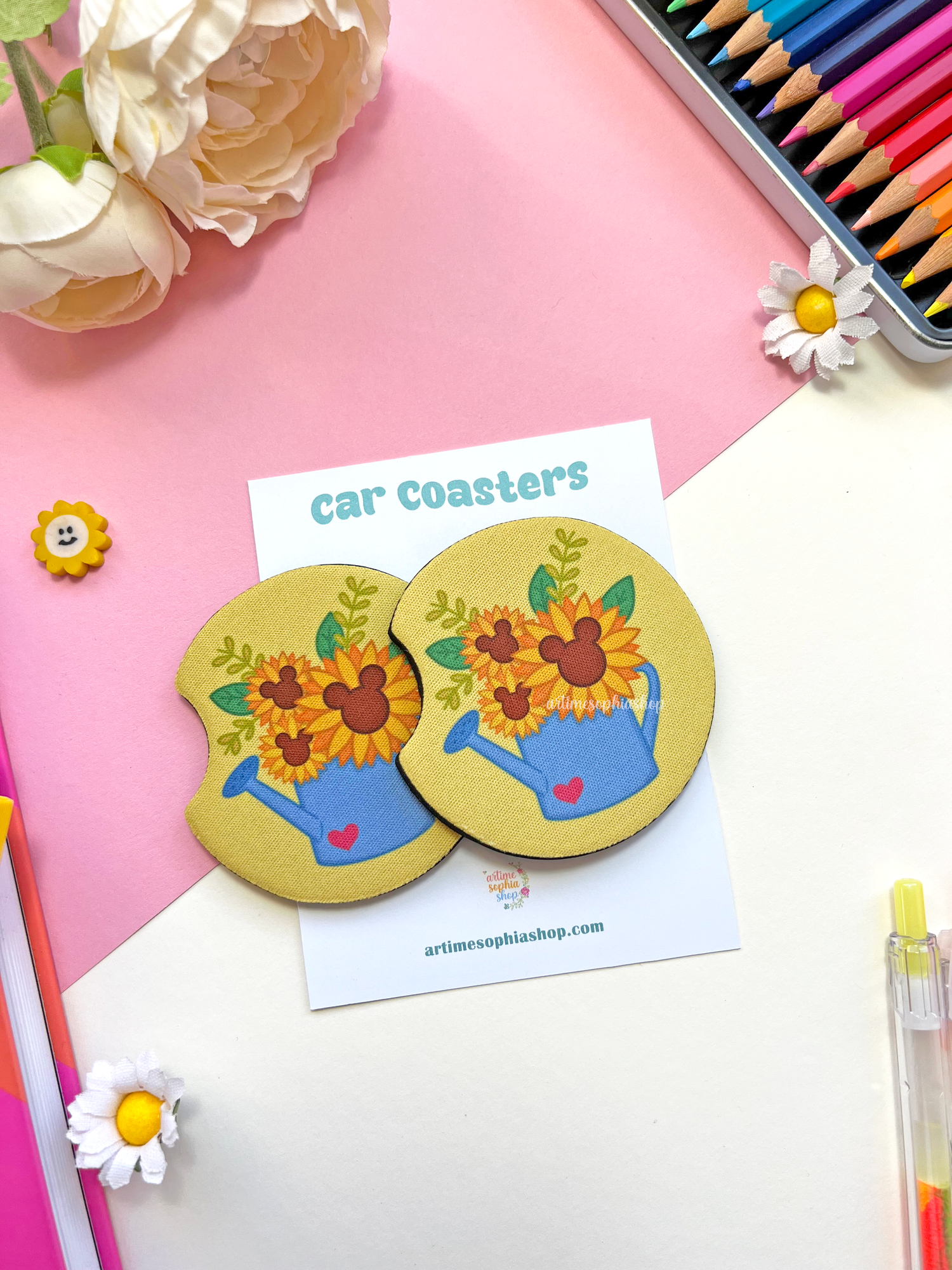 Set of two round sunflower car coasters with bright yellow petals and hidden Mickey details, made of neoprene for a clean and colorful car interior.