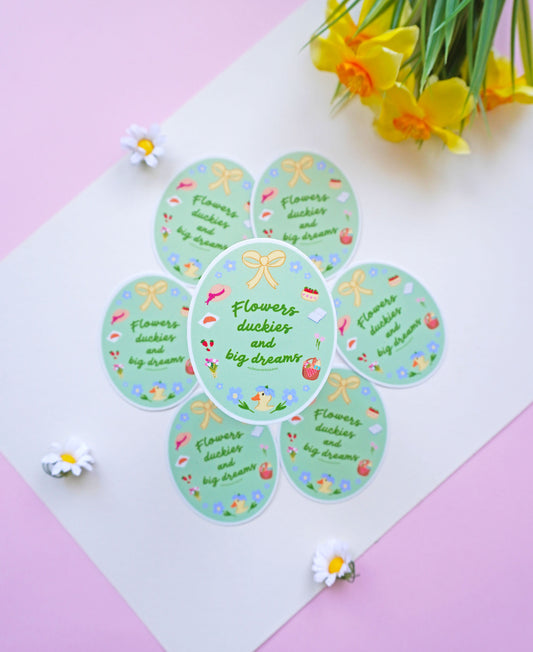 Vintage-inspired oval sticker with flowers, ribbons, duck illustration and cottagecore details