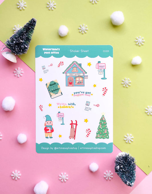 Set of 12 vinyl stickers with matte finish featuring festive illustrations from Winterland, including Elf Ellie, a vintage post office, sleigh, mailbox, and more.