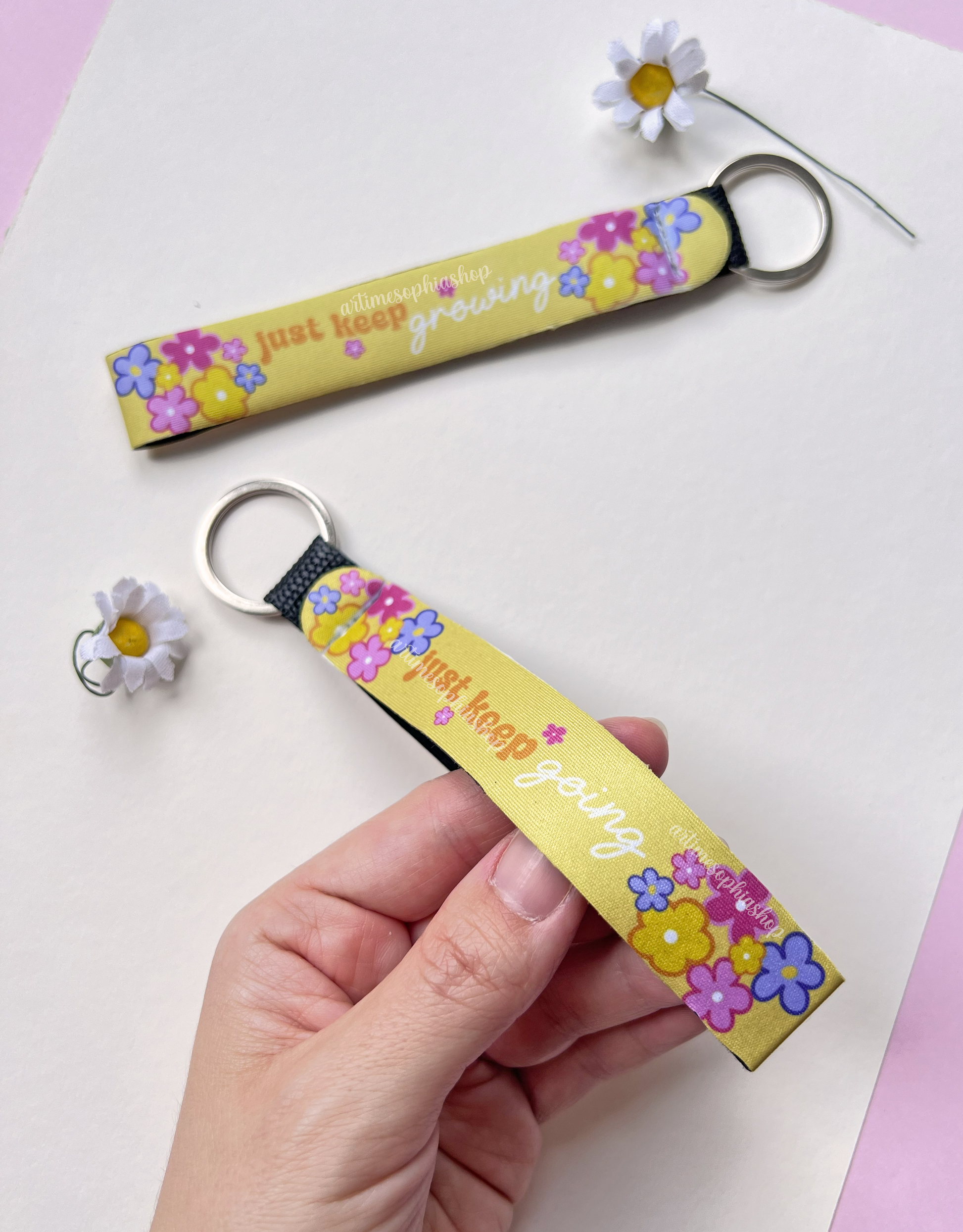 Close-up of yellow neoprene wrist keychain with metal ring
