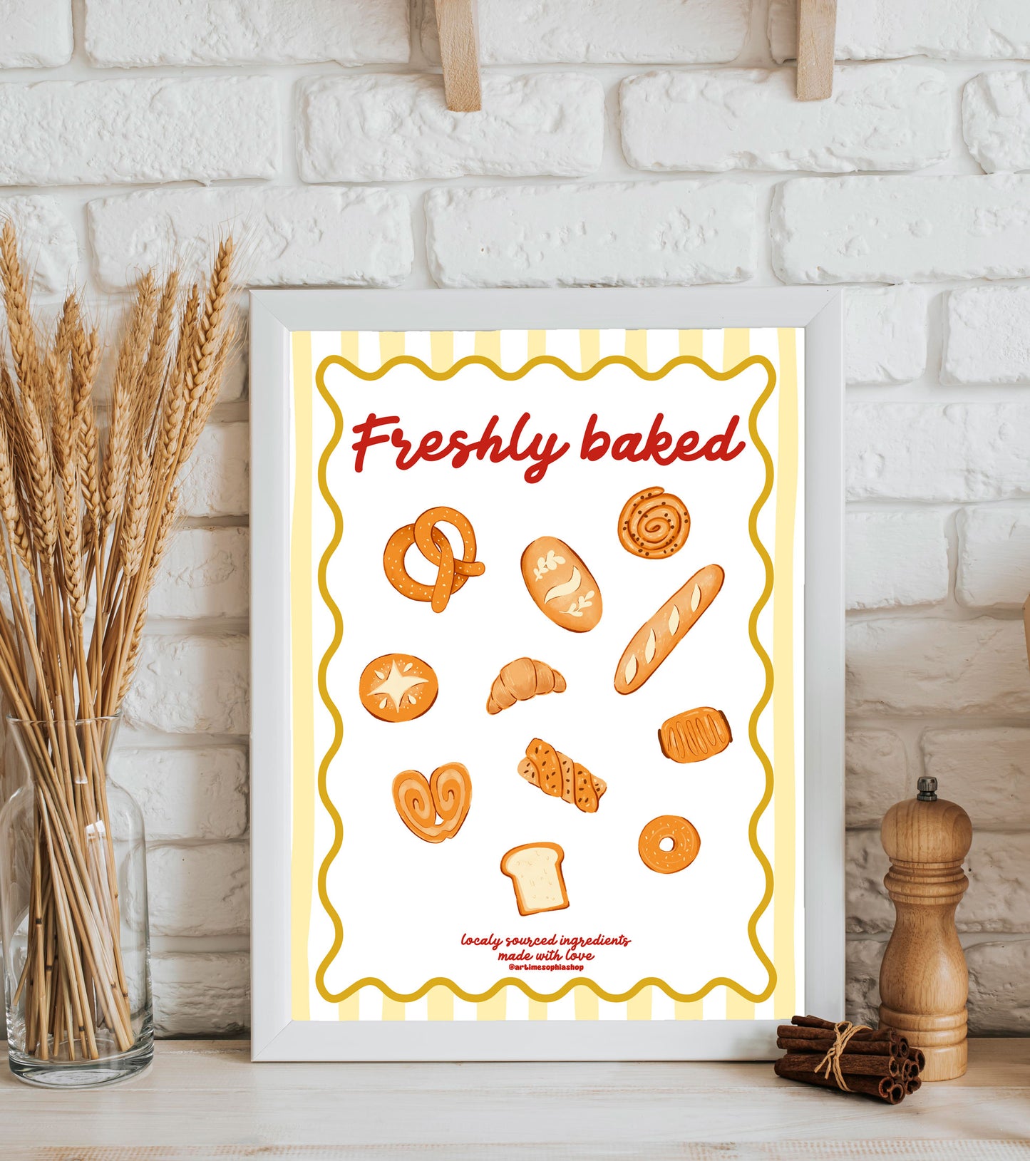 llustrated bakery-themed art print featuring hand-drawn breads and pastries with the phrase "Freshly Baked" on a yellow striped background.
