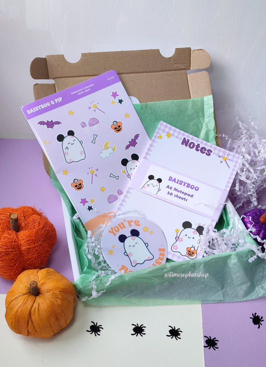 Flat lay of spooky mystery boxes with Halloween-themed stationery from the Daisyboo & Pip collection